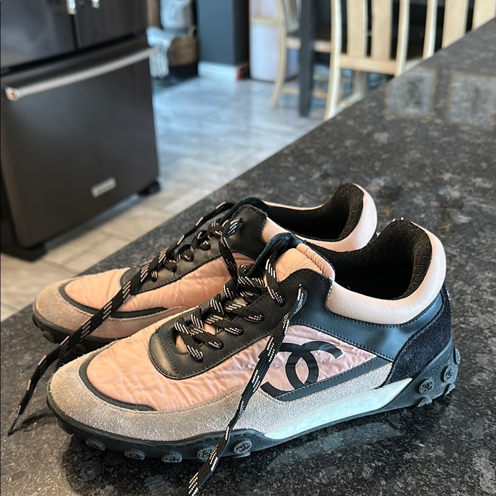 CHANEL Coco Pharell Williams Pink and Black Athletic Sneakers
